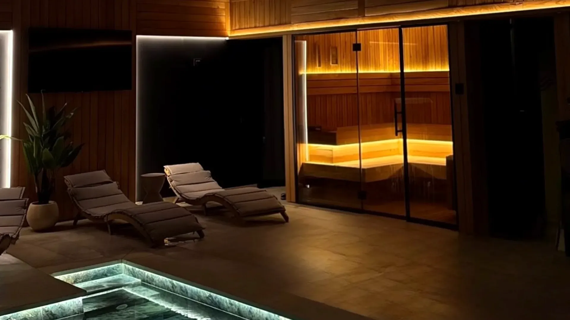 Luxury heated indoor pool with ethereal moonlit ceiling and mountain views at Rodnei Retreat & Spa Borșa